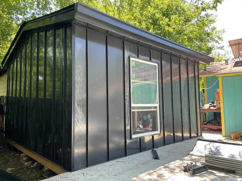 Black standing seam metal wall panels for Metal Roof Installation in Crowley