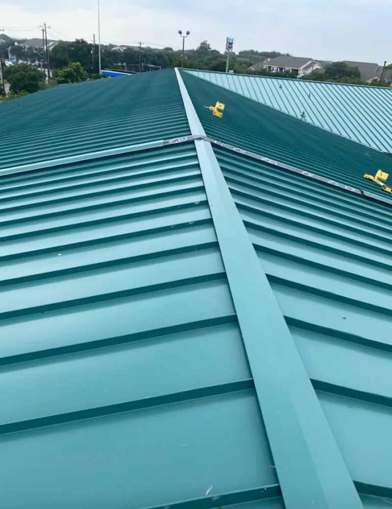 Green commercial metal roof ridge and valley for Metal Roof Repair in Crowley